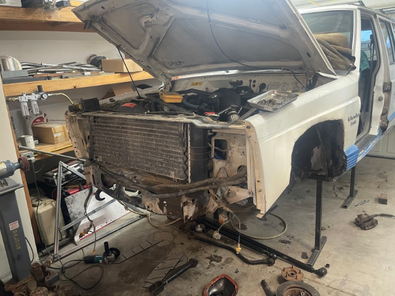 White Jeep gets ready for Frame stiffeners